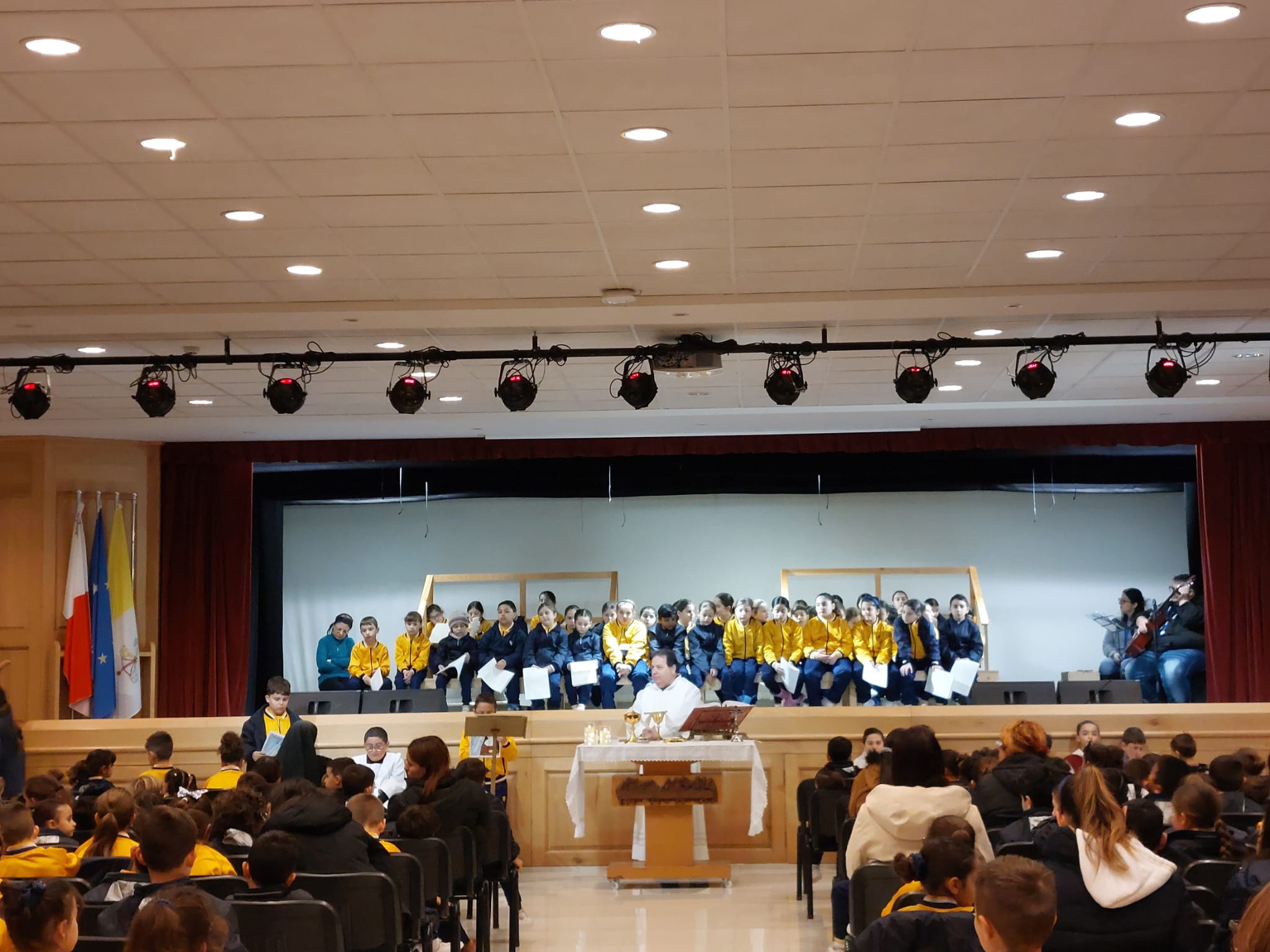 Students taking part in a religious activity